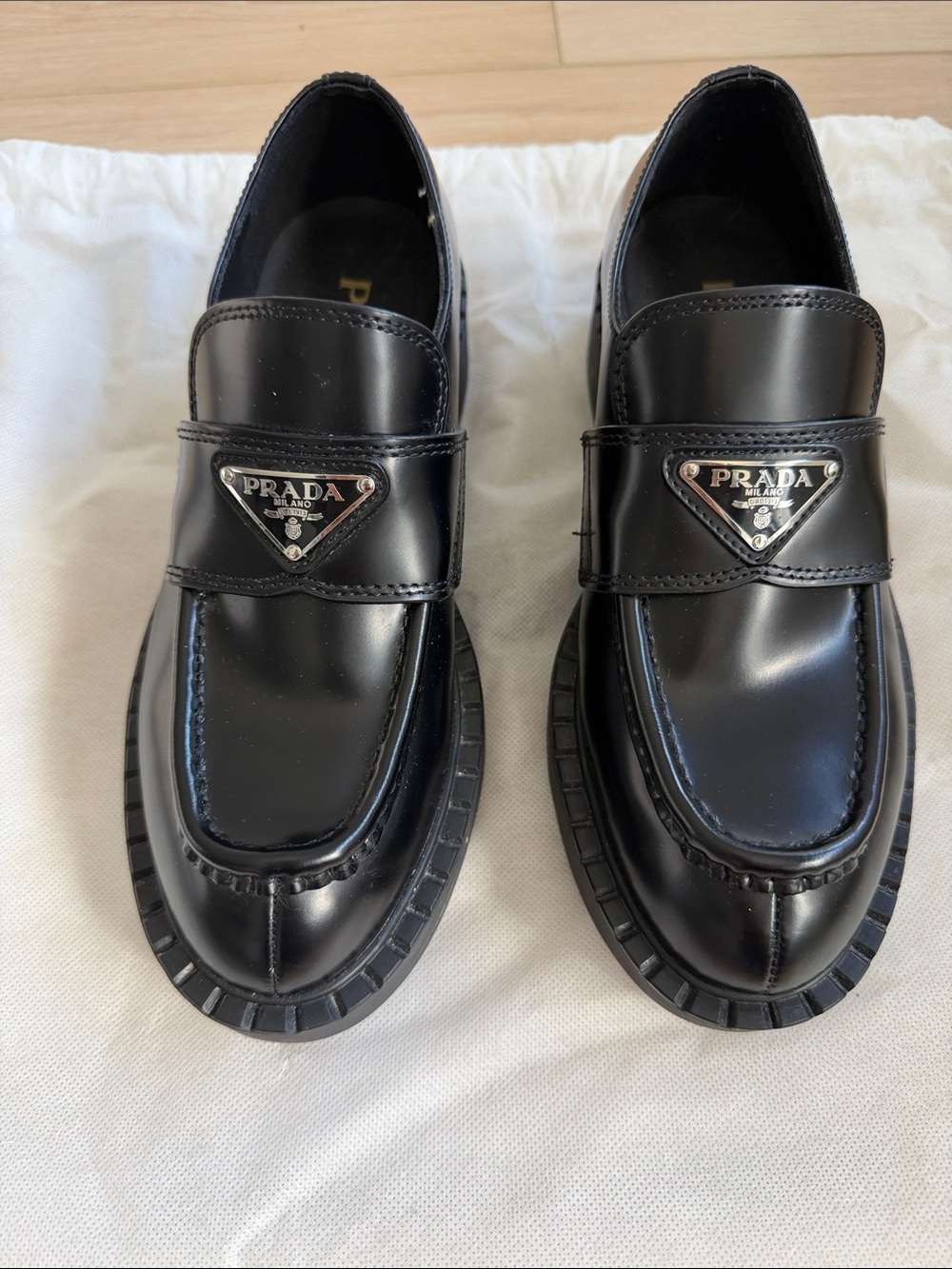 Chocolate Brushed Leather Loafers Silver Black Metal Triangle Logo